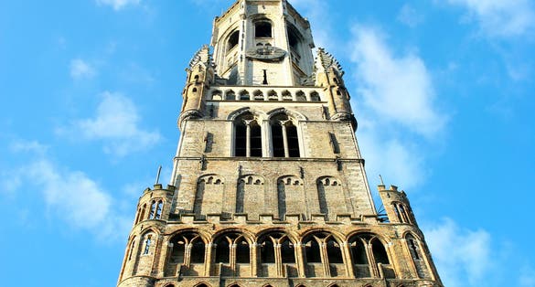 Photo of Belfry tower architecture in Markt square, in Bruges, Belgium.