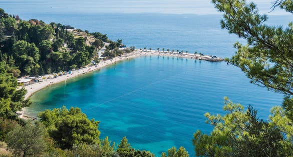 Photo of aerial view of famous Kašjuni beach from Marjan Hill, Split, Croatia.