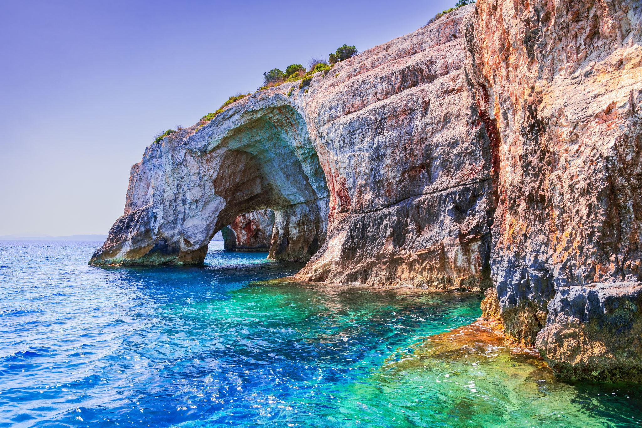 photo of view of Blue caves on Zakynthos island in Greece.