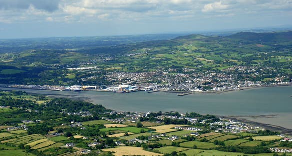 Photo of aerial view of the Newry River, where it flows into Carlingford Bay, along which the border between Northern Ireland and the Republic of Ireland passes.