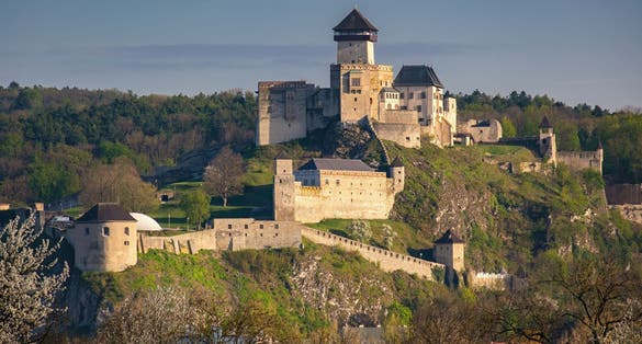 Trenčín (Trencin) Castle is a castle above the town of Trencin in western Slovakia. Spring nature, flowering trees, medieval castle