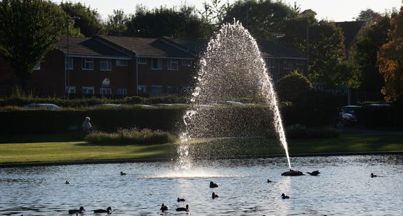 Photo of fountain in the lake in Eastrop park, Basingstoke, UK.