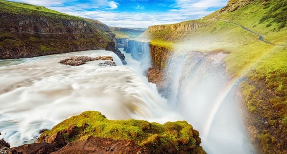 photo of Iceland, Gullfoss waterfall. Captivating scene with rainbow of gullfoss waterfall that is most powerful waterfall in Iceland and Europe. Picturesque summer scene with amazing Icelandic waterfall.