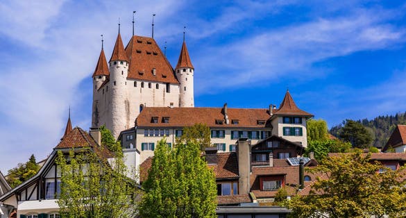 photo of Thun Castle . Switzerland travel and landmarks. Famous Thun lake and Thun town with medieval castle popular tourist destination.