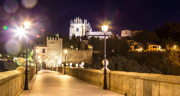 photo off view of Bridge San Martin in Toledo, Spain in a beautiful summer night