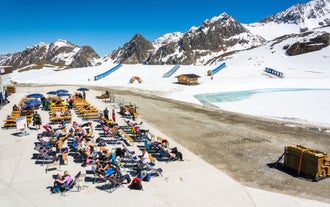 Photo of Outdoor sitting area of Eisgrat mountain station at Stubai Glacier in  Gemeinde Neustift im Stubaital.