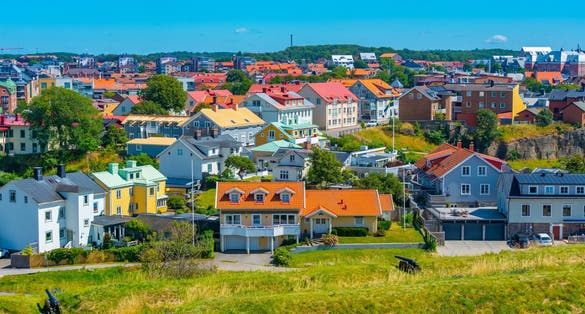 photo of Colorful timber houses in Swedish town Varberg.