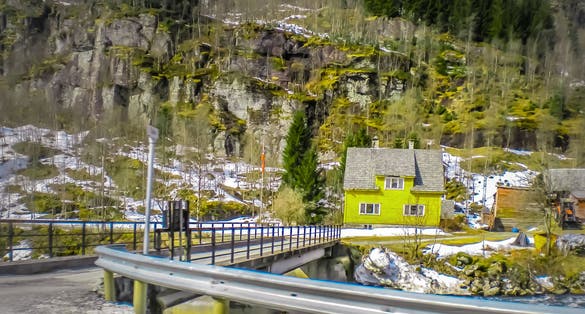 Photo of beautiful tranquil landscape of Norway at Sognefjorden and Flåm little village with an old railway in the mountains in the middle of Norwayز