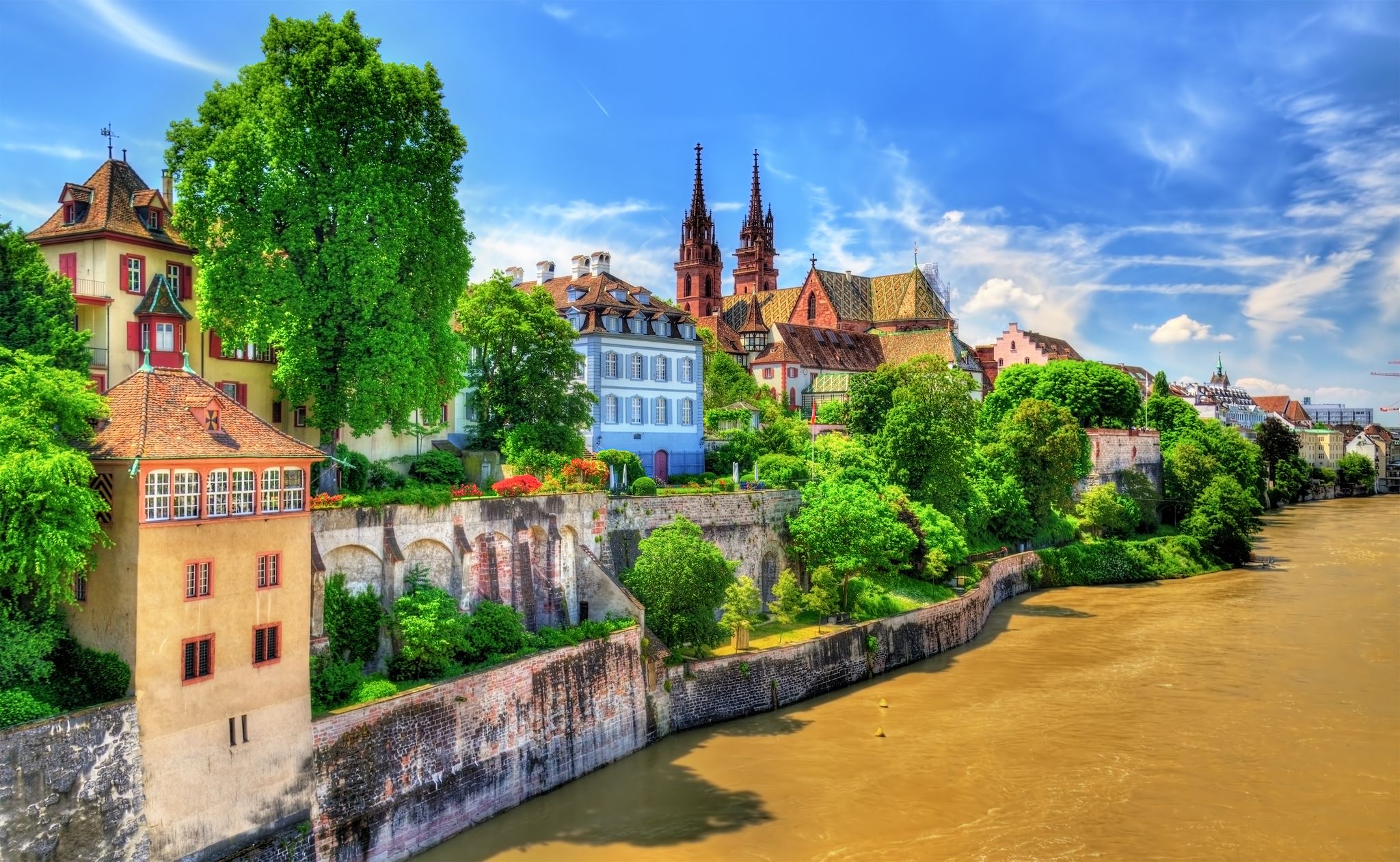 Photo of old town of Basel with the cathedral above the Rhine river - Switzerland.