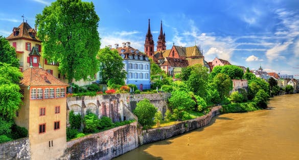 Photo of old town of Basel with the cathedral above the Rhine river - Switzerland.