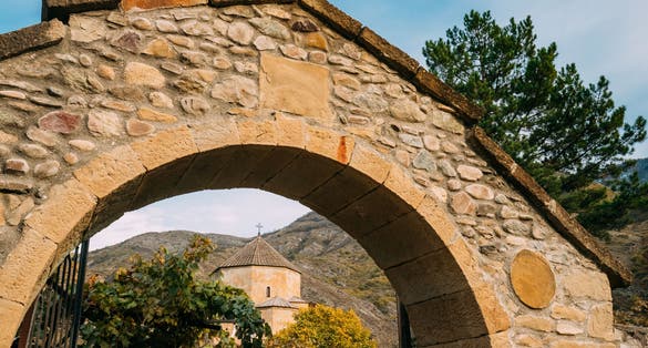 Photo of Arch Entrance Gates To Georgian Orthodox Ateni Sioni Church Is In The Village Of Ateni, Some 10 Km South Of The City Of Gori, Georgia. 