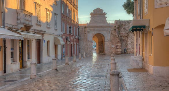 Photo of sea gate in the historical center of Croatian town Zadar, Croatia.
