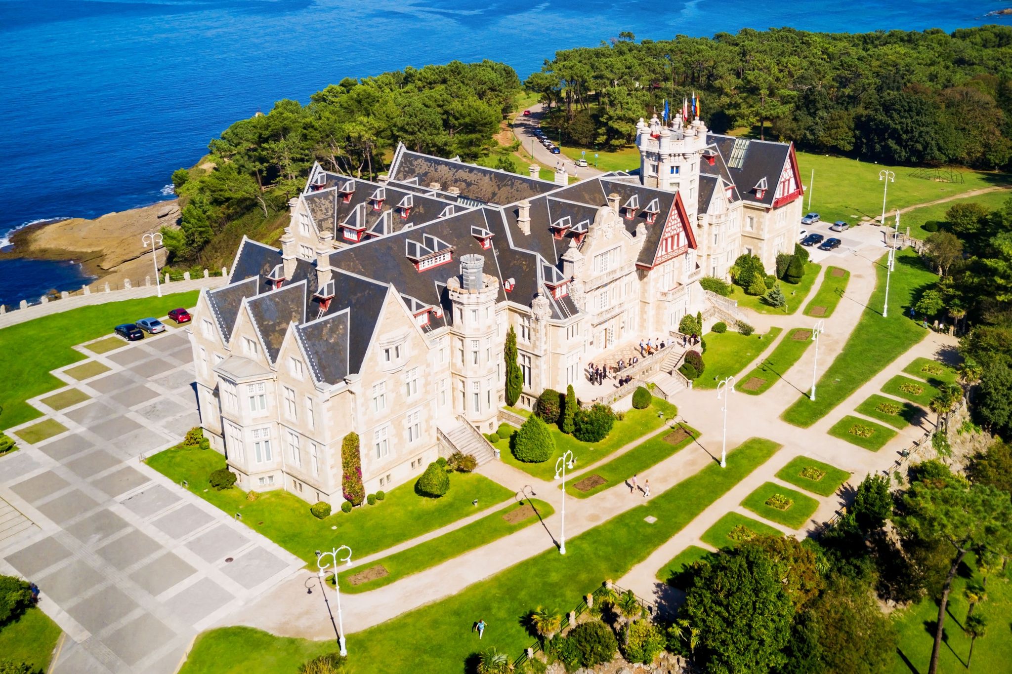 Photo of Magdalena Palace or Palacio de la Magdalena aerial panoramic view. It is a palace located on the Magdalena Peninsula in Santander city, Spain.