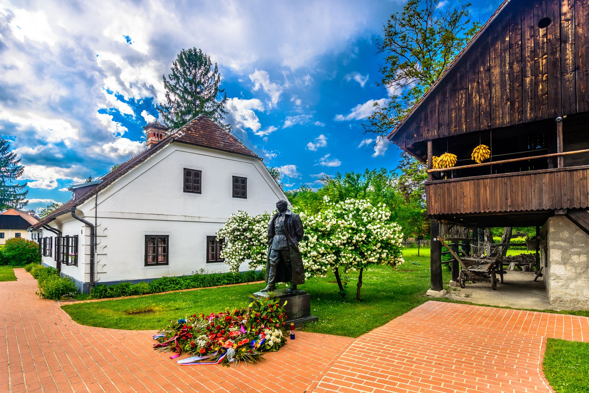 Scenic view at picturesque village Kumrovec in Zagorje region, statue of former leader and president of Josip Broz Tito. / Selective focus.