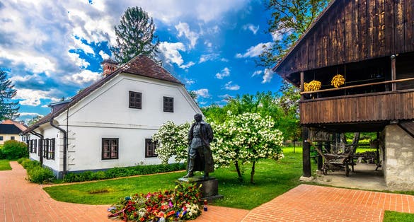 Scenic view at picturesque village Kumrovec in Zagorje region, statue of former leader and president of Josip Broz Tito. / Selective focus.