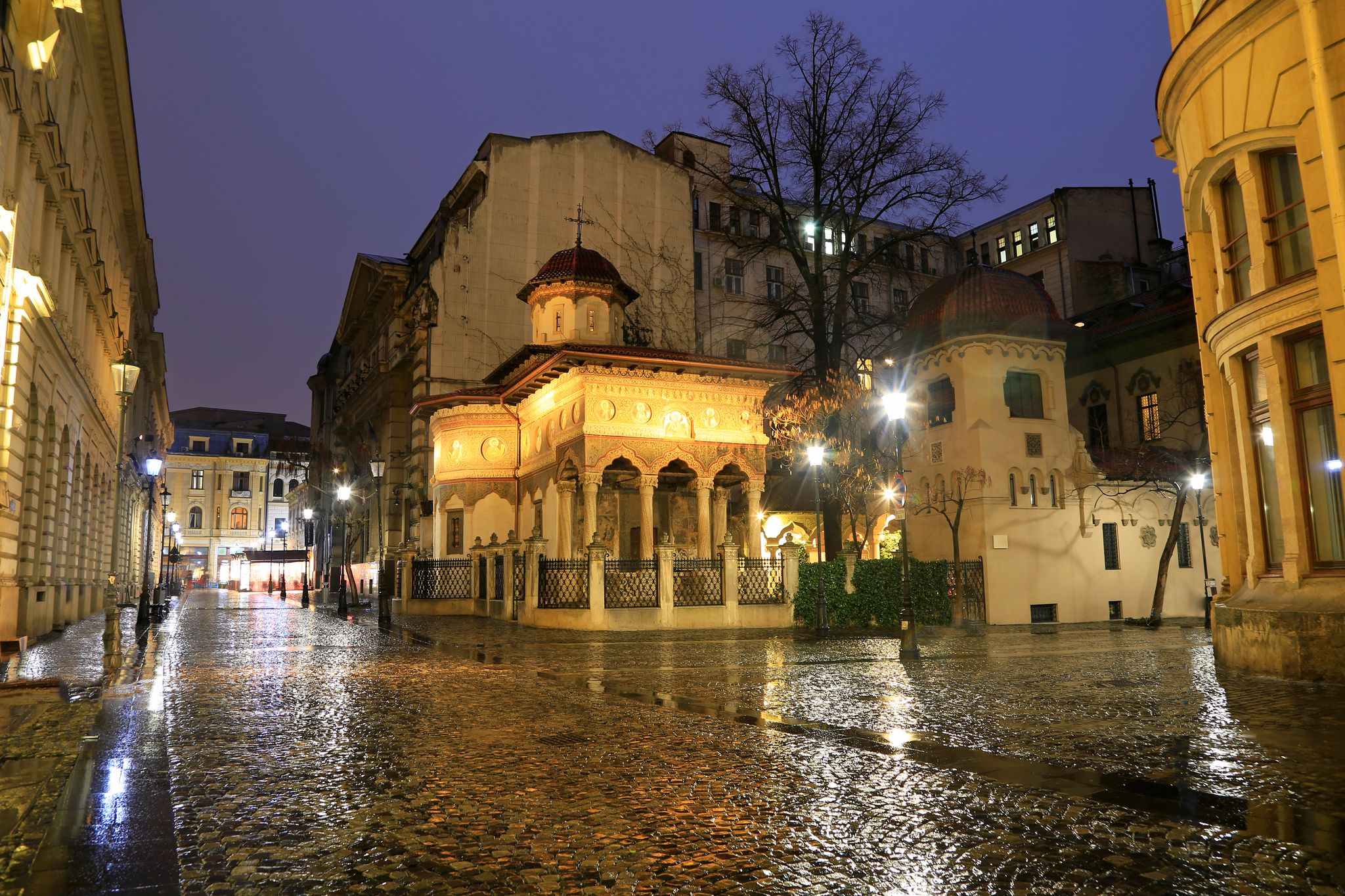 Photo of Stavropoleos Church by night, Bucharest. Old town tourist attraction in Romania .