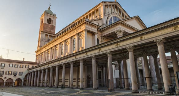 Italian city at sunrise. Historic center of Novara, piazza della Repubblica (square della Repubblica) with Novara cathedral (Duomo di Novara or Cattedrale di Santa Maria Assunta), north Italy
