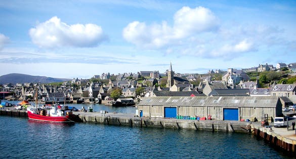 photo of arriving by ship to coastal port town of Kirkwall on Orkney Islands, Scotland.