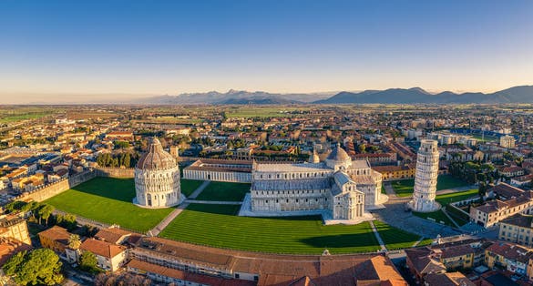 photo of aerial image of the square of miracles with pisa’s leaning tower, Cathedral of santa maria assunta and baptistery in Pisa, Tuscany, Italy.