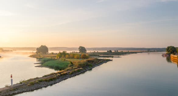 photo of sunrise over border river Oder. Oder is river between Poland and German. Sunrise view from Frankfurt Oder.