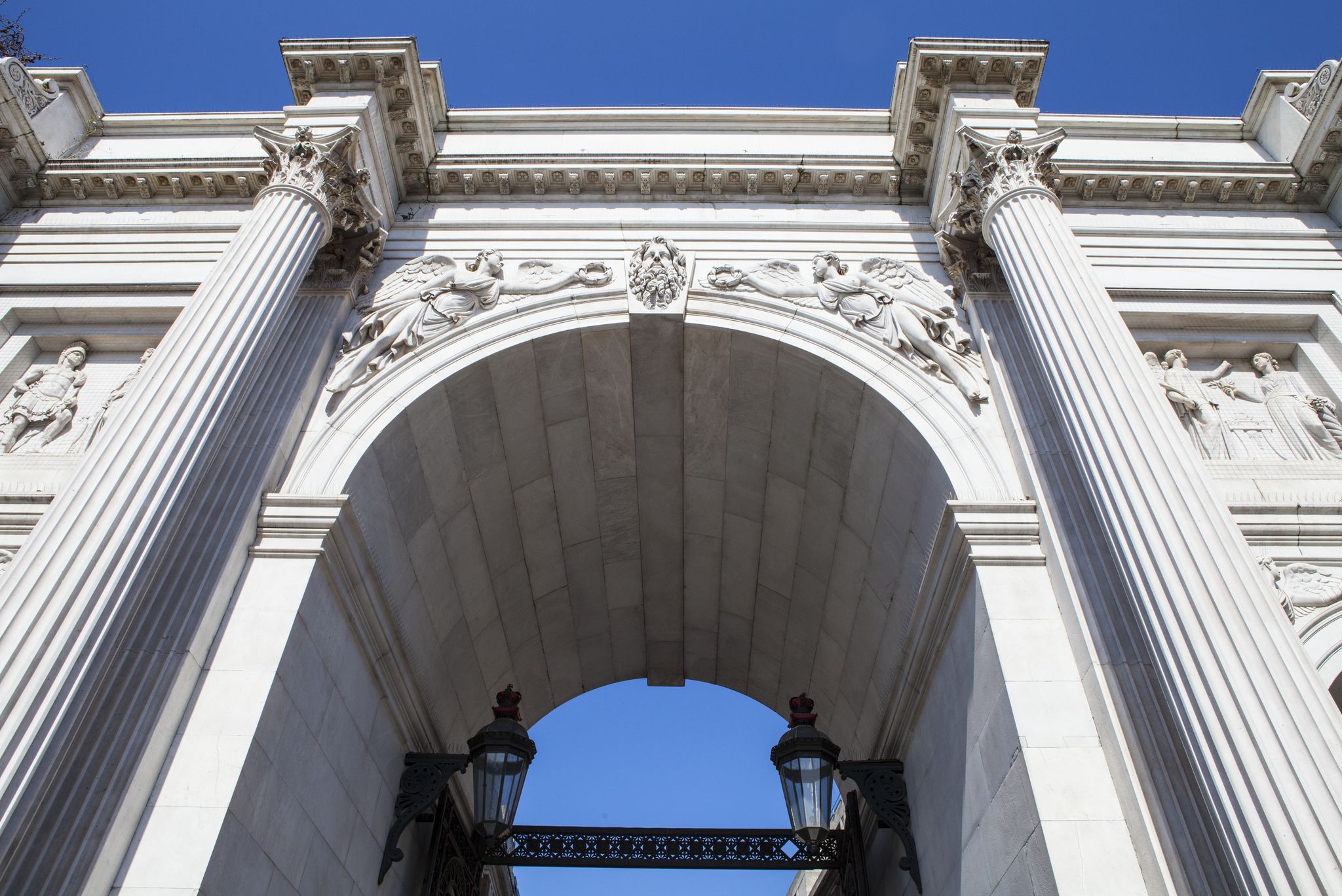 Photo of Looking up view at the magnificent Marble Arch in London, UK.