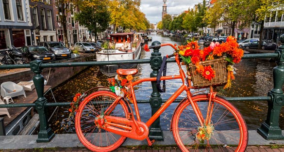  Amsterdam, the Netherlands - October 14, 2021: Canals and typical dutch architecture 