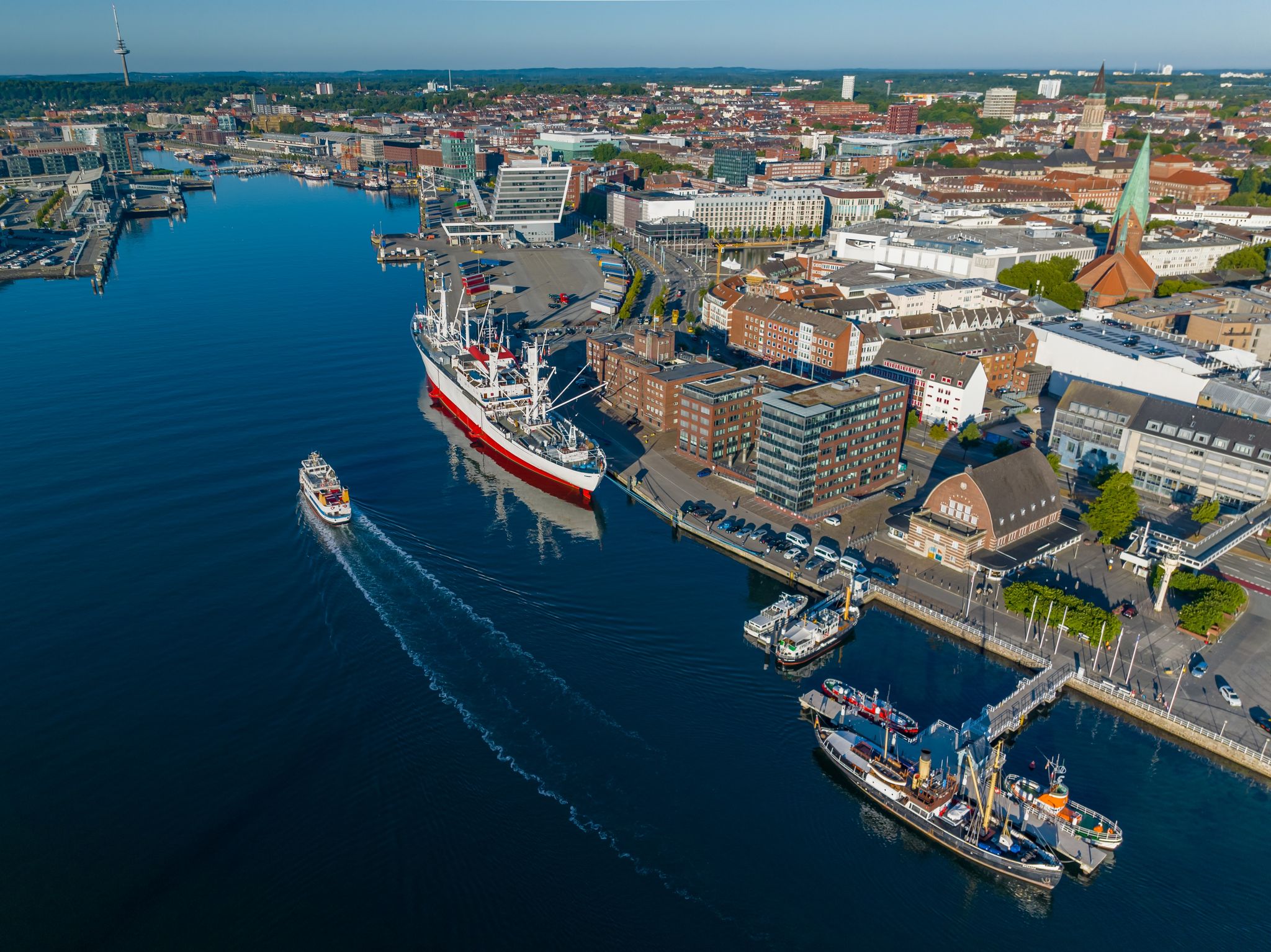 photo of view of Aerial view of port of Kiel, Schleswig-Holstein, Germany. Aerial view of world's largest museum freight ship moored in Kiel harbour.