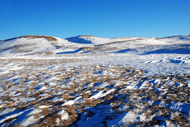 photo of view of On the trails of the Crêt de la Neige from the Col de Crozet in winter, on snowshoes, Crozet, France.