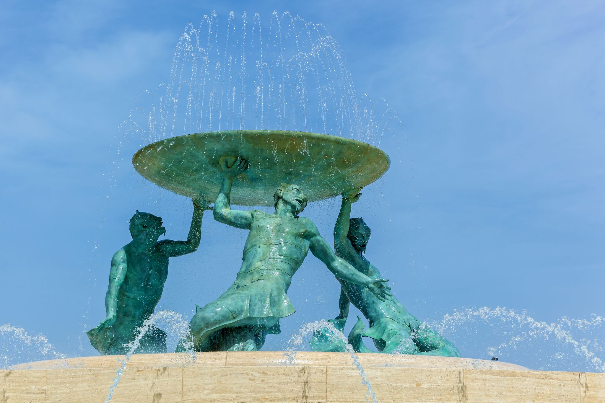 Photo of Iconic Triton fountain in front of the Valletta, capital city of Malta.