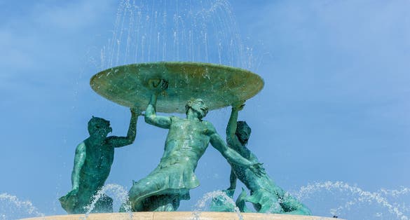 Photo of Iconic Triton fountain in front of the Valletta, capital city of Malta.