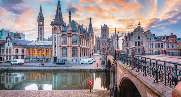 Photo of Ghent old town cityscape from the Graslei are at dawn, Belgium.