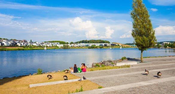photo of Phoenix See lake is an artificial lake on the former steelworks Phoenix East in Dortmund district Horde,Düsseldorf Düsseldorf germany.