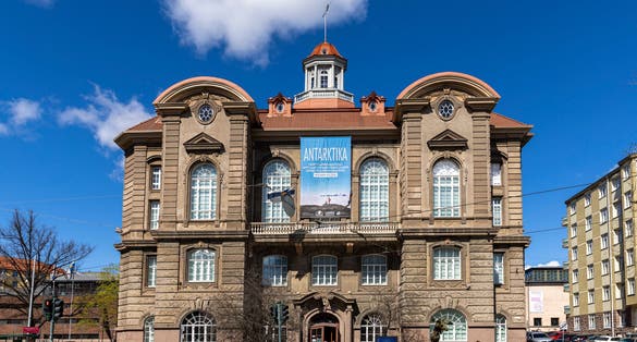 Photo of Natural History museum is located next to Finnish parliament building and attracts tourists all year long, Helsinki, Finland.