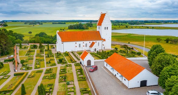 Photo of aerial view of Elmelunde Church in Denmark.