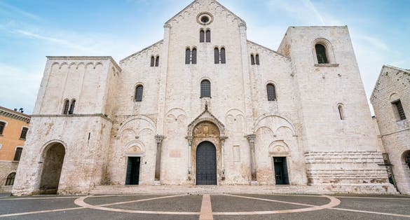 photo of Saint Nicholas Basilica (Basilica di San Nicola) in old town Bari. Apulia (Puglia), Italy.