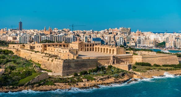 Photo of aerial view of Fort Saint Angelo of Birgu in Malta from the sea.