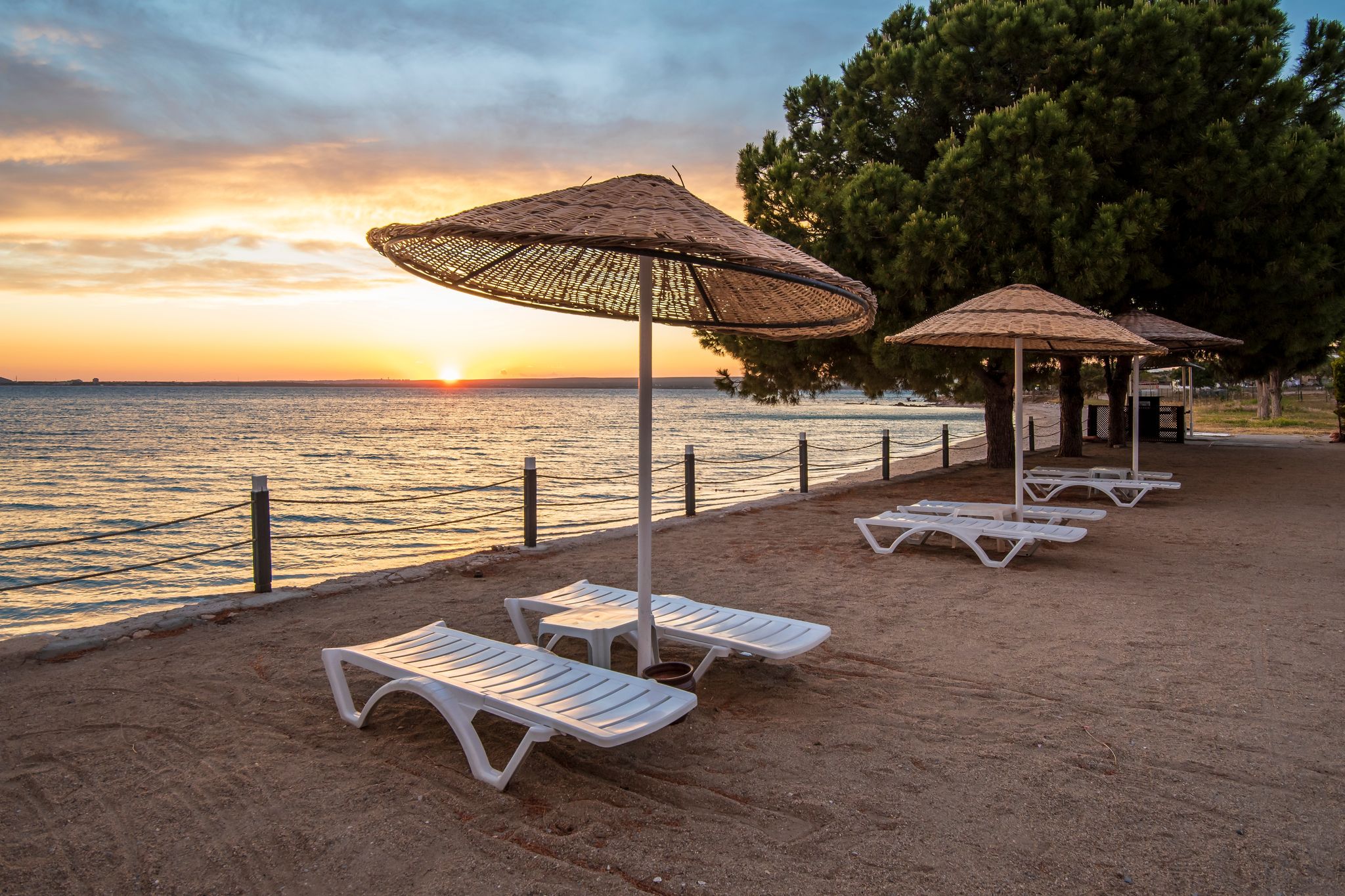 Photo of beautiful sunset at Bozbuk beach in Didim of Turkey.