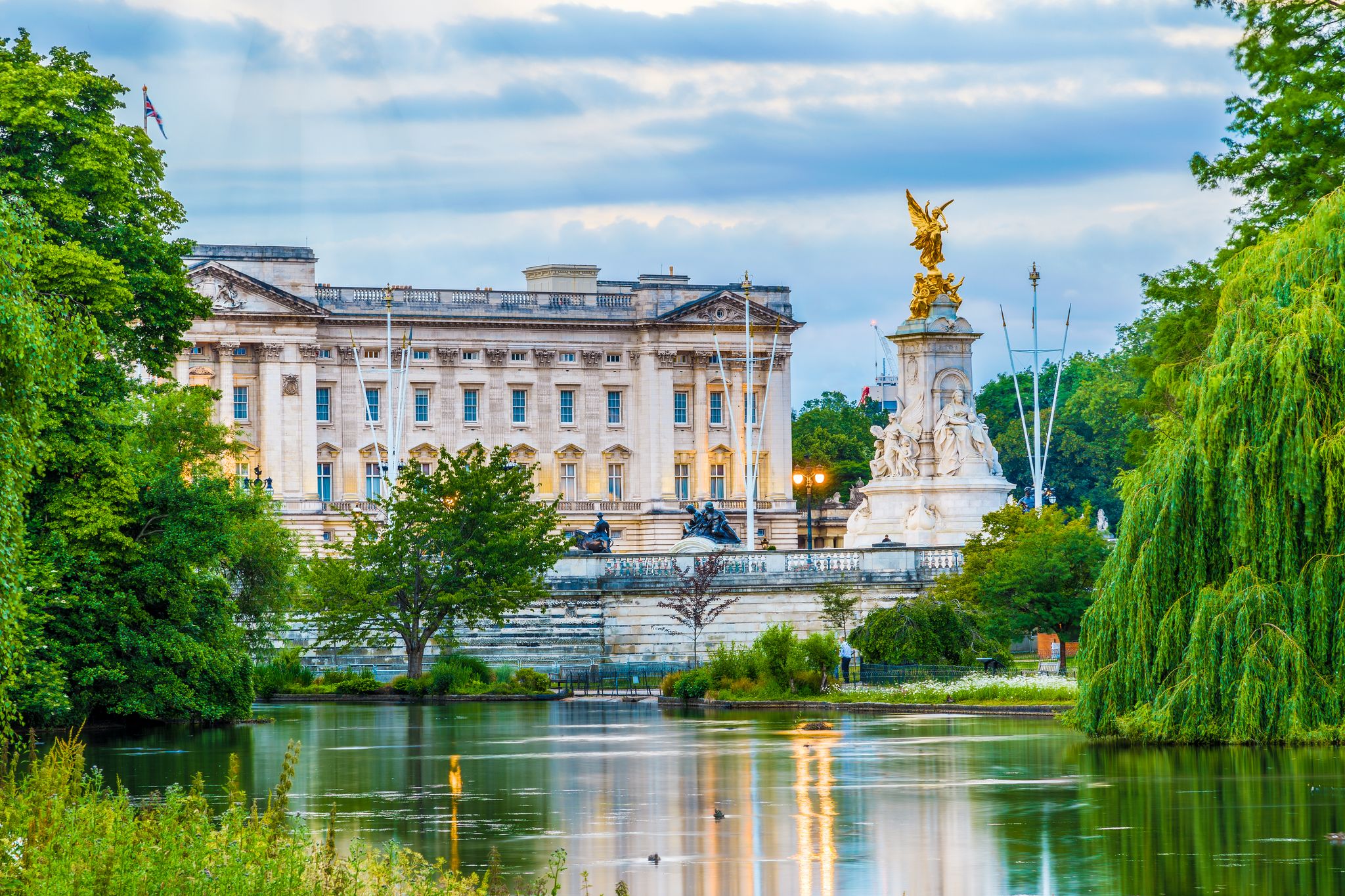 Photo of Buckingham Palace seen from St. James Park in London, UK.