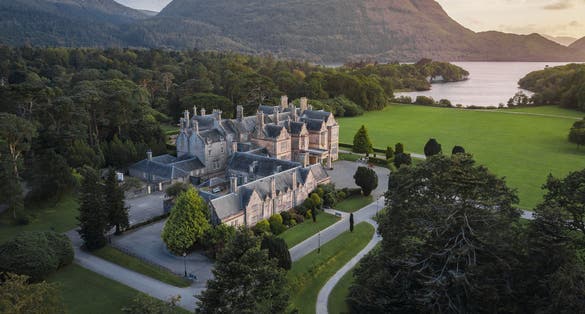 Photo of aerial view of Muckross House and gardens in National Park Killarney, Ireland.