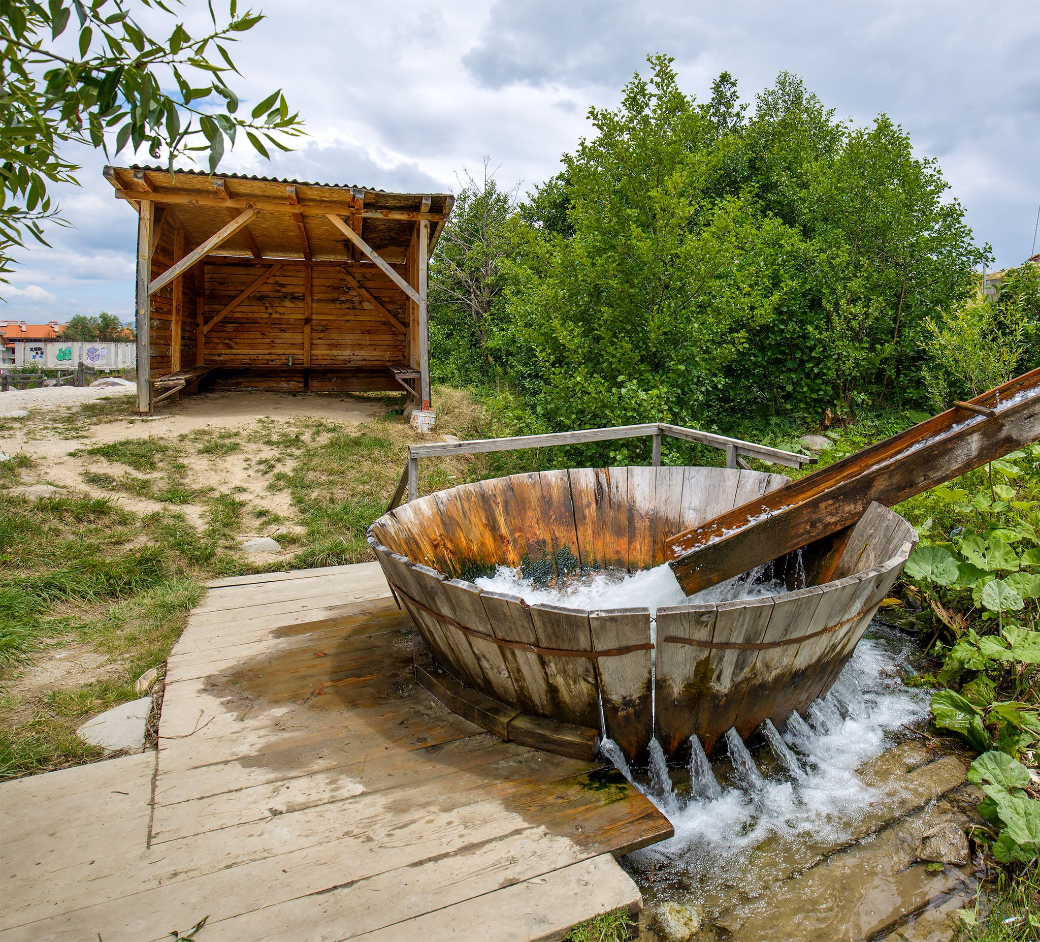 Photo of Ancient natural washing machine built in the yard of the house in Bansko.