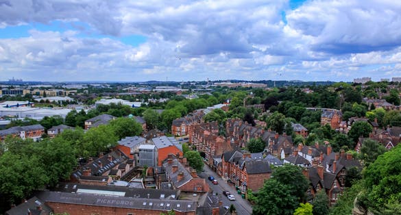 Photo of The high angle view of the Nottingham cityscape with stunning cloudscape. Nottingham, England, UK. Travel and nature scene.