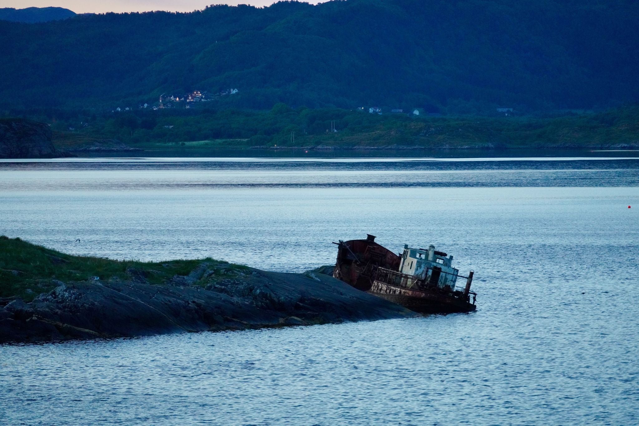 photo of view of A shipwreck near the Atlantic Ocean Road between Molde and Kristiansund, Norway.