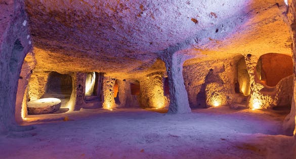 photo of Derinkuyu underground city tunnels, Cappadocia, Turkey. the largest excavated underground city in Turkey.