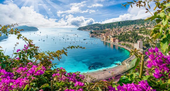 Photo of French Riviera coast with medieval town Villefranche sur Mer, Nice region, France.