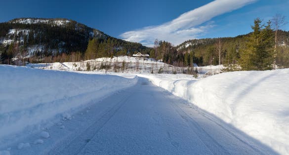 Photo of abstract landscape in the mountains, with reflection of the forest in the river at Kongsberg, Norway.