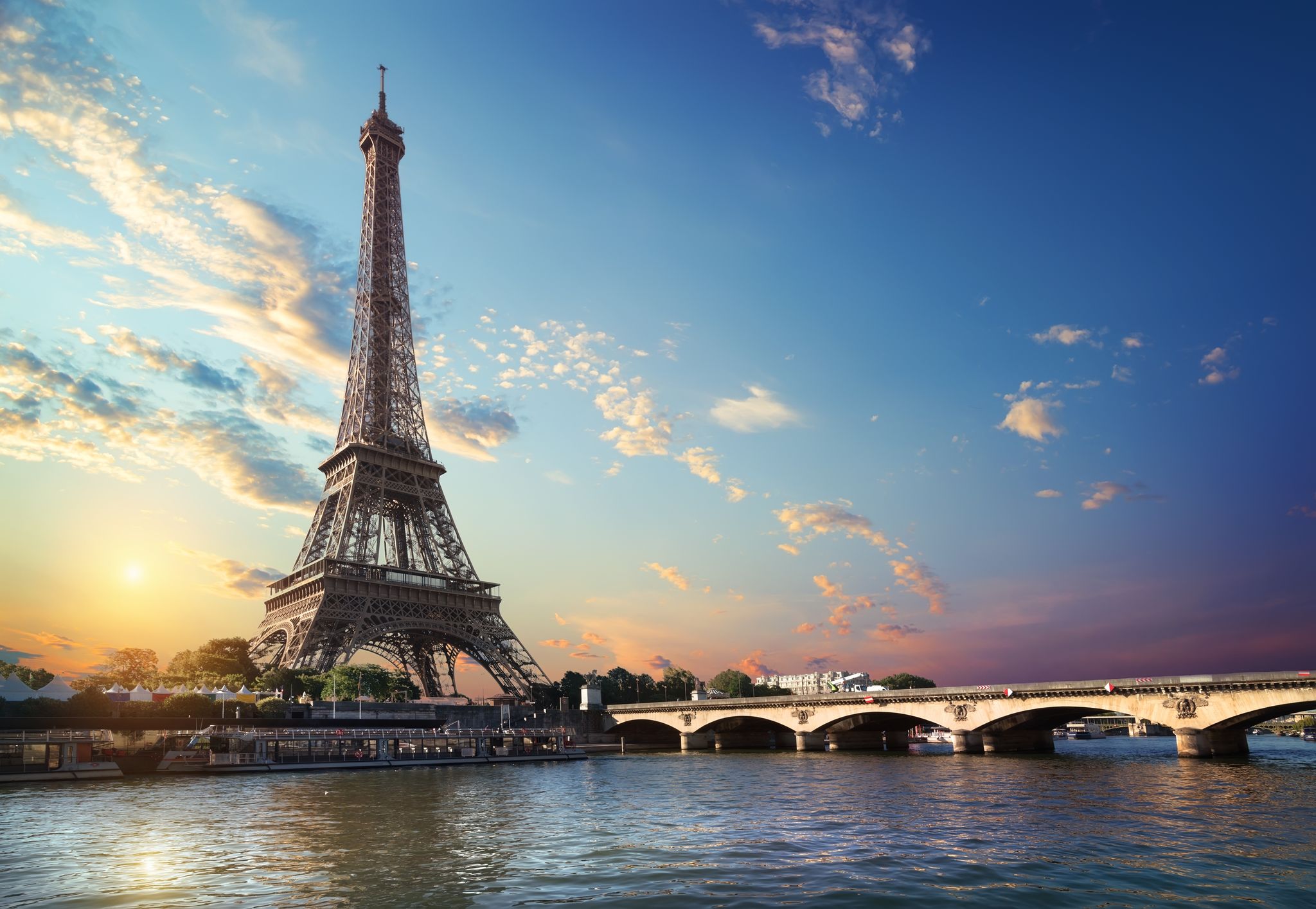 Eiffel Tower and bridge Iena on the river Seine in Paris, France.jpg