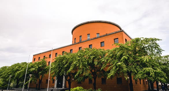 photo of beautiful Stockholm Stadsbibliotek (City Library) by Historical Swedish Architect Gunnar Asplund. Built in 1928.Front/Side View Landscape in Sweden.