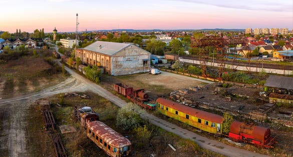 photo of Europe hungary Budapest. Old train cemetery and museum. Aerial photos about an abandoned place. There are much old rust train.