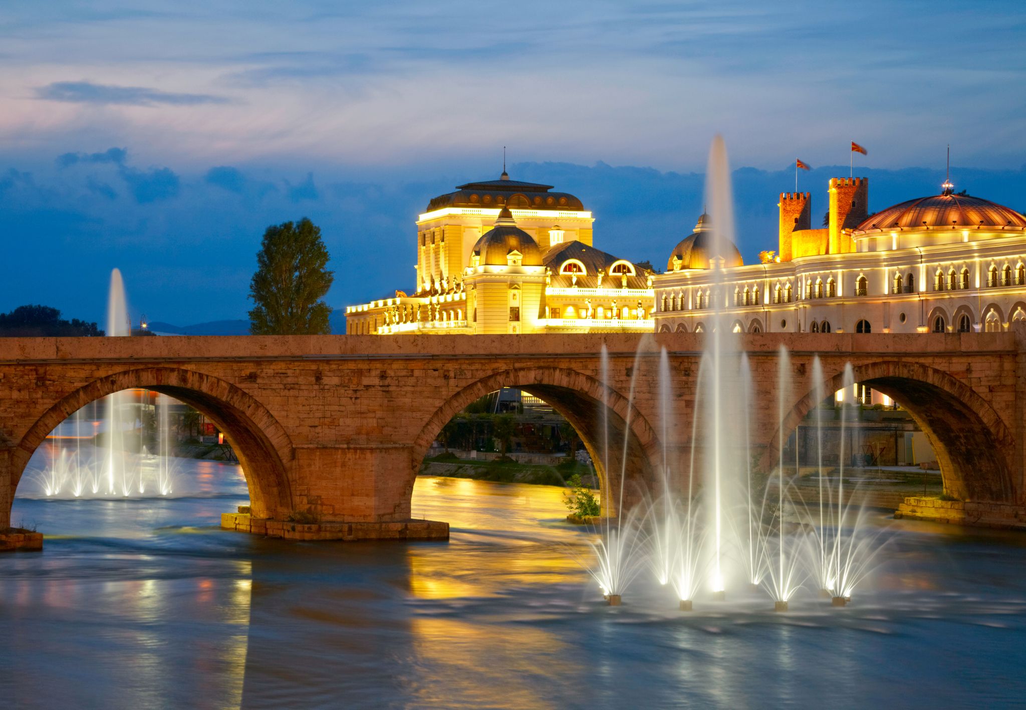 Photo of famous Stone bridge at night in Skopje, Macedonia.