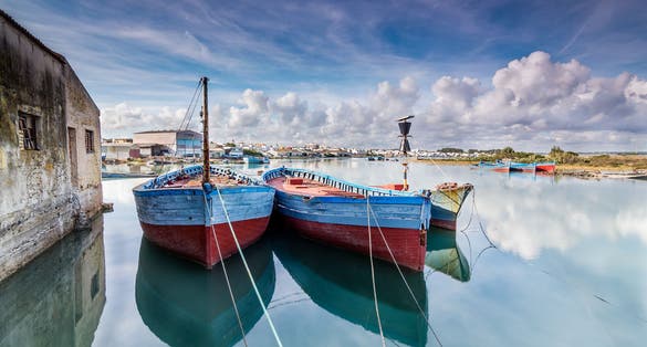 Fishing boats used for tuna fishing by an ancient Phoenician art of fishing called 'Almadraba'. Barbate, Cadiz, Spain.